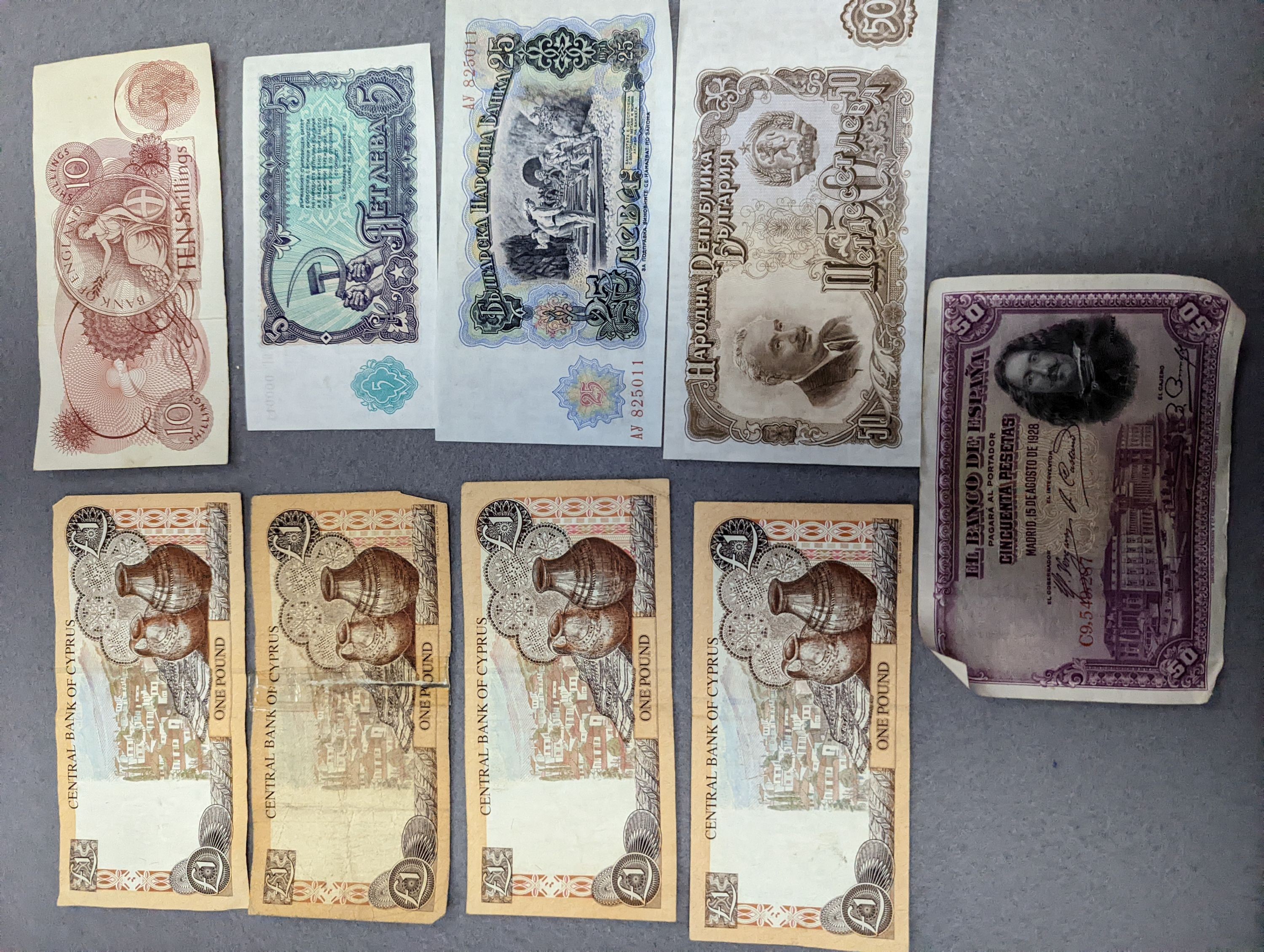 A collection of coins and banknotes